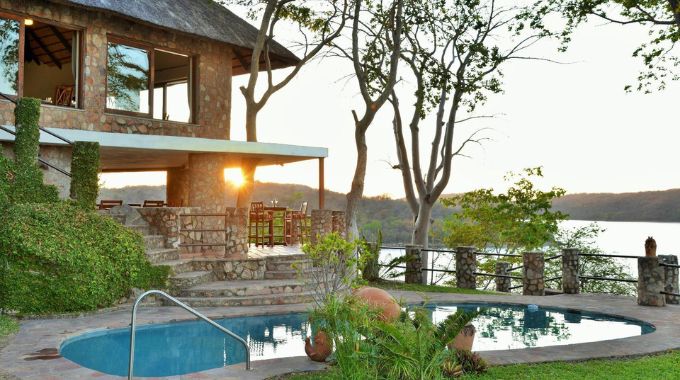 Tourist Accommodation in Zimbabwe 5 Masumu River Lodge boasts spectacular views over Lake Kariba – encapsulating the western waters and characteristic islands of this area.