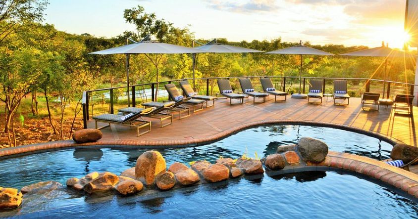 Four kilometres from the falls, on a plateau overlooking Zambezi National Park, the Victoria Falls Safari Lodge was designed as an open-plan treehouse, and it shows.