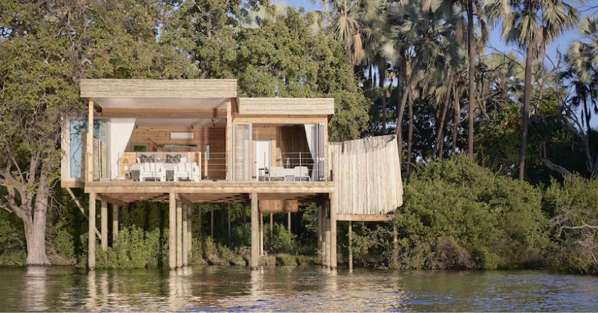 The Victoria Falls River Lodge manages both simultaneously by placing guests in private treehouse suites on a small island in the middle of the Zambezi River.